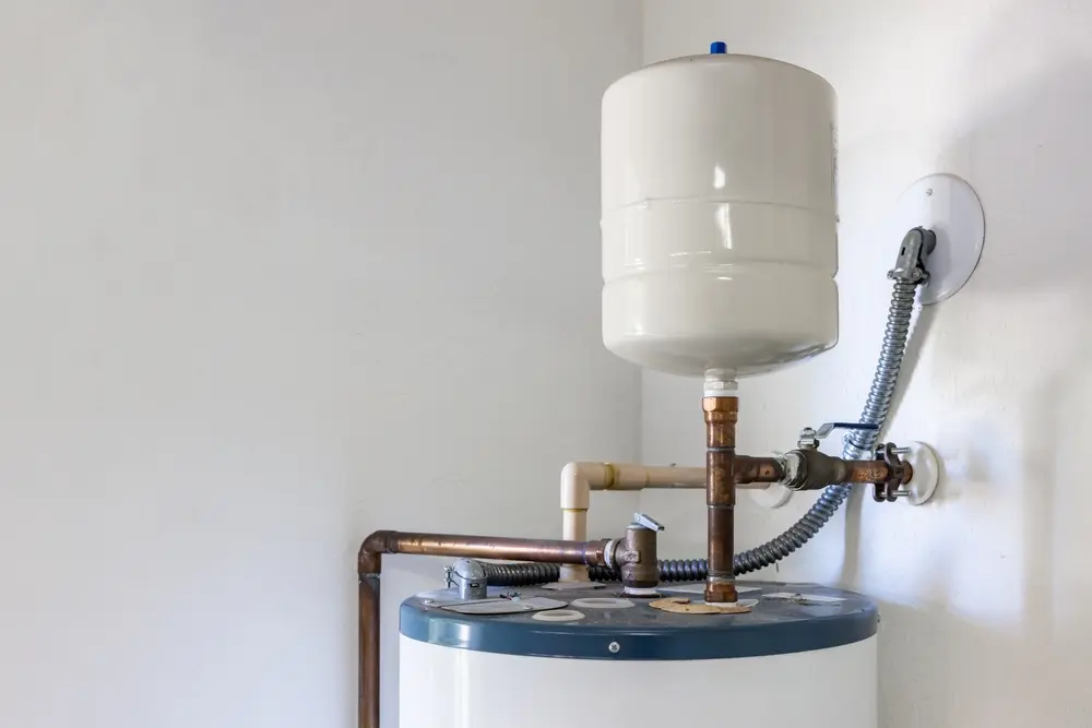 Tankless water heater vs hybrid heat pump tank